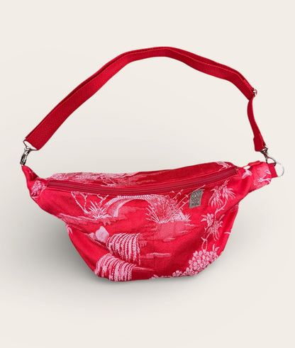 Riñonera roja grulla