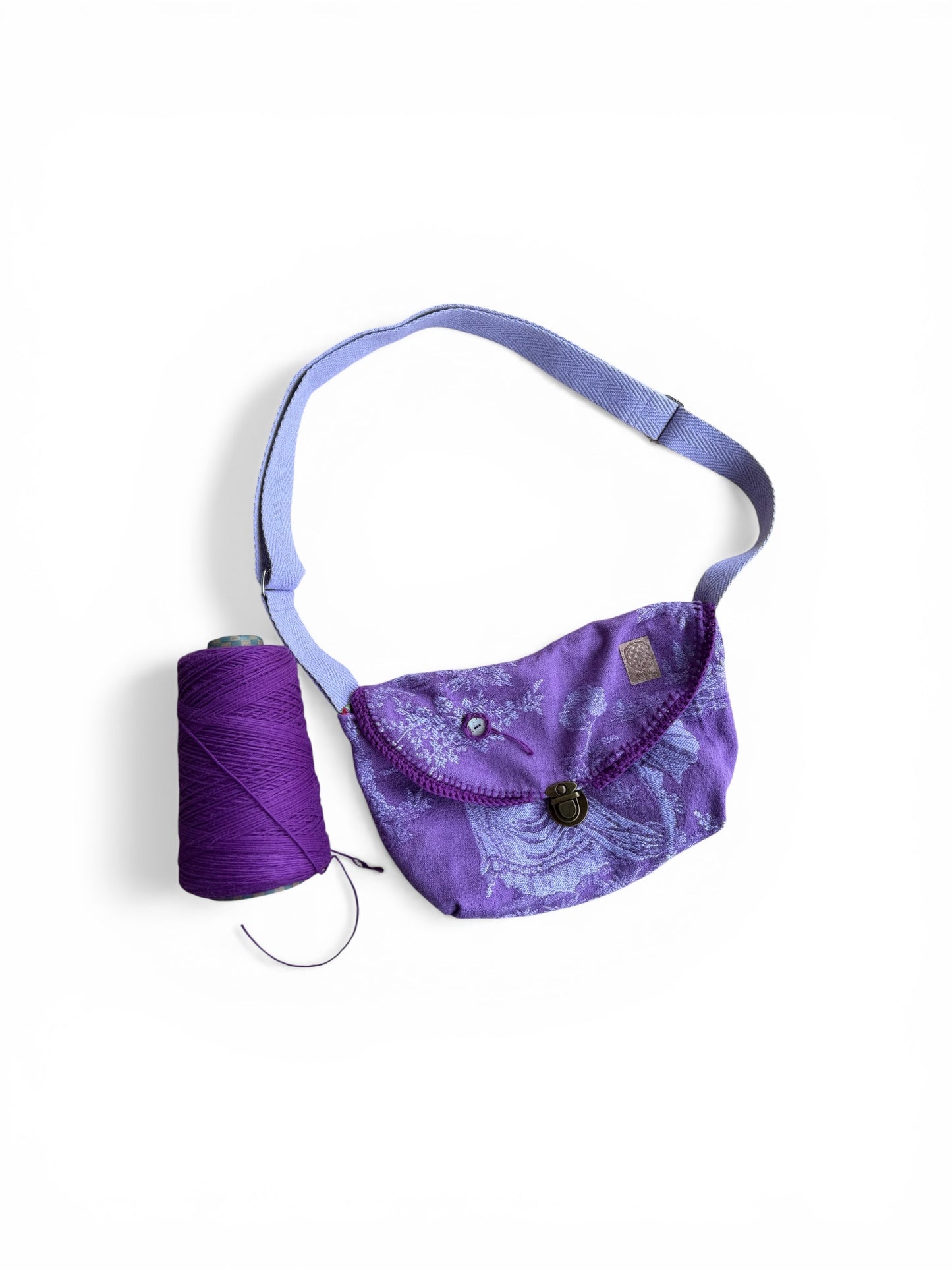 Ona “BANDOLERA” lila